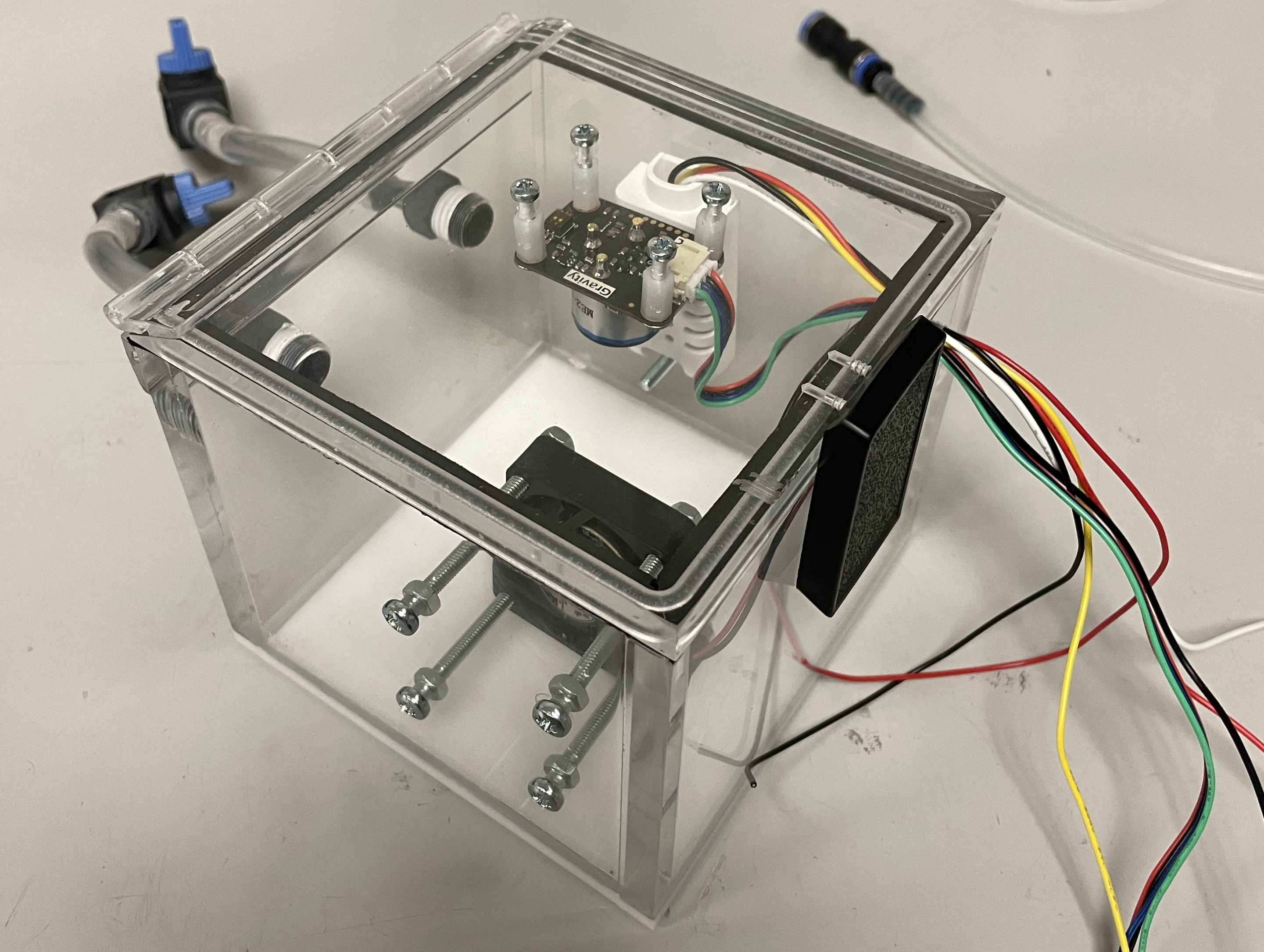 Sealed test chamber with sensors and fan